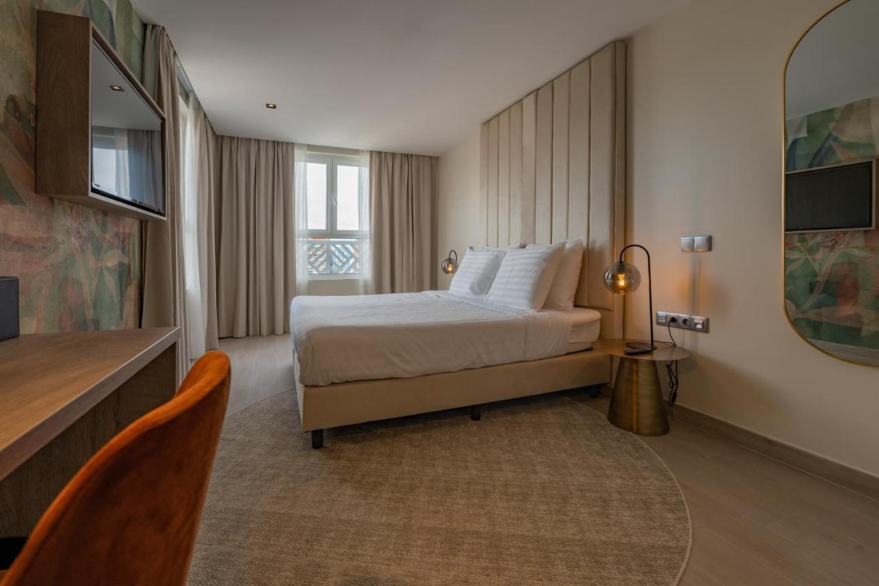 Kamer met Kingsize Bed en Uitzicht op de Haven
